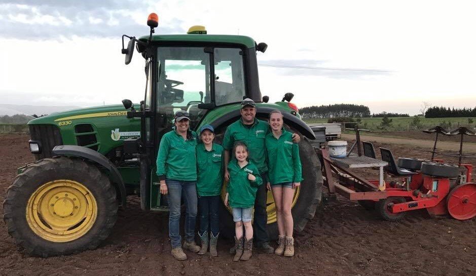 Pictured: Corey and Janelle Spencer (Owners, C&J Spencer Agriculture) with their family at their farm in Bracknell